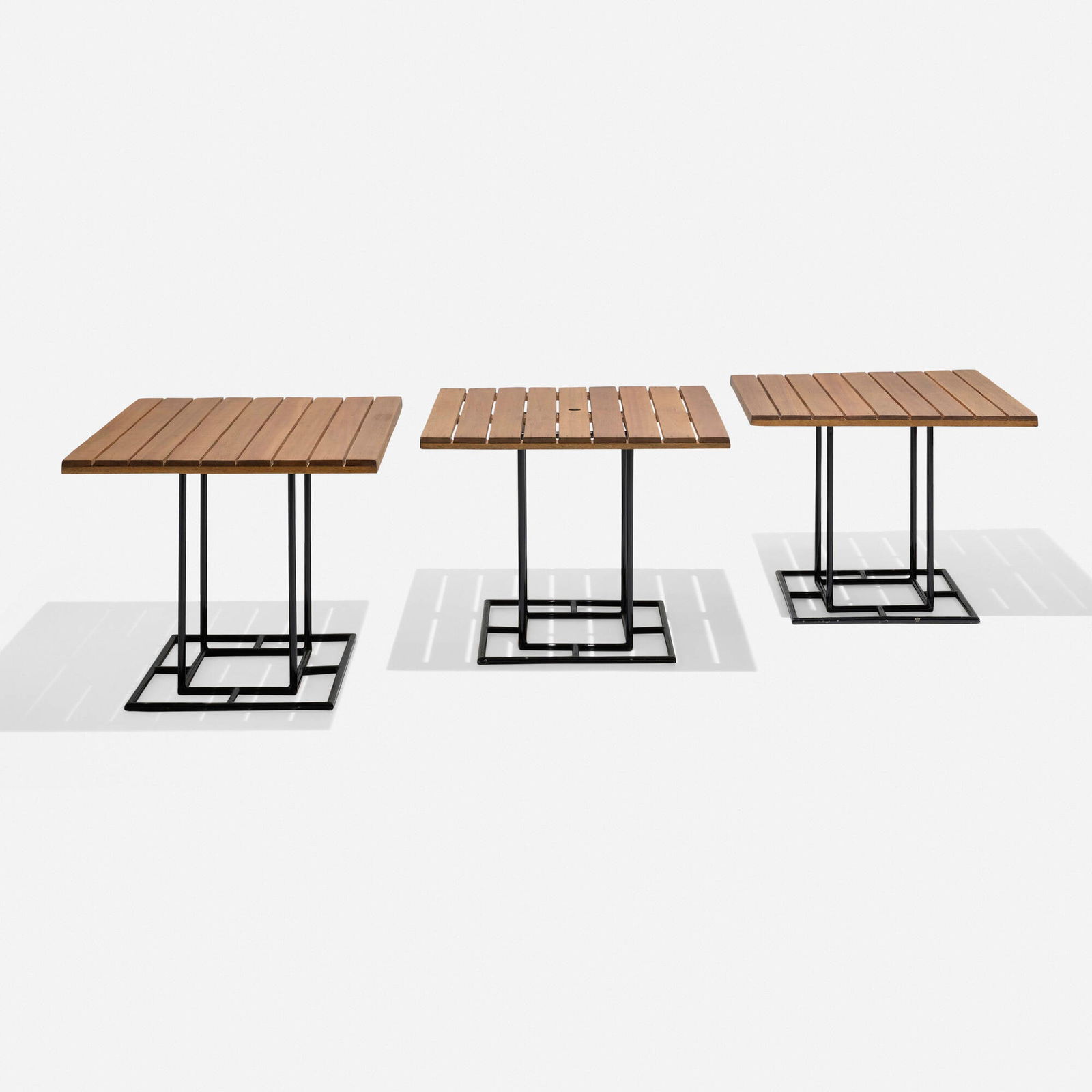 Walter Lamb, Cafe tables model WT-2701, set of three: Walter Lamb Cafe tables model WT-2701, set of three Brown JordanUSA, c. 1950enameled bronze, koa 29.75 h x 35.5 w x 35.5 d in (76 x 90 x 90 cm) One table features a factory hole to hold