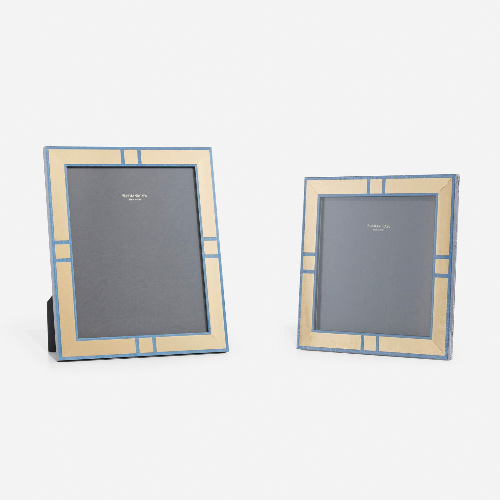 Armani/Casa, Holly picture frames, set of two: Armani/Casa Holly picture frames, set of two Italy, new productionbeech veneer, gold leaf, glass 12 h x 10 w in (30 x 25 cm) 10 h x 10 w in (25 x 25 cm) Stamped manufacturer's mark to rever
