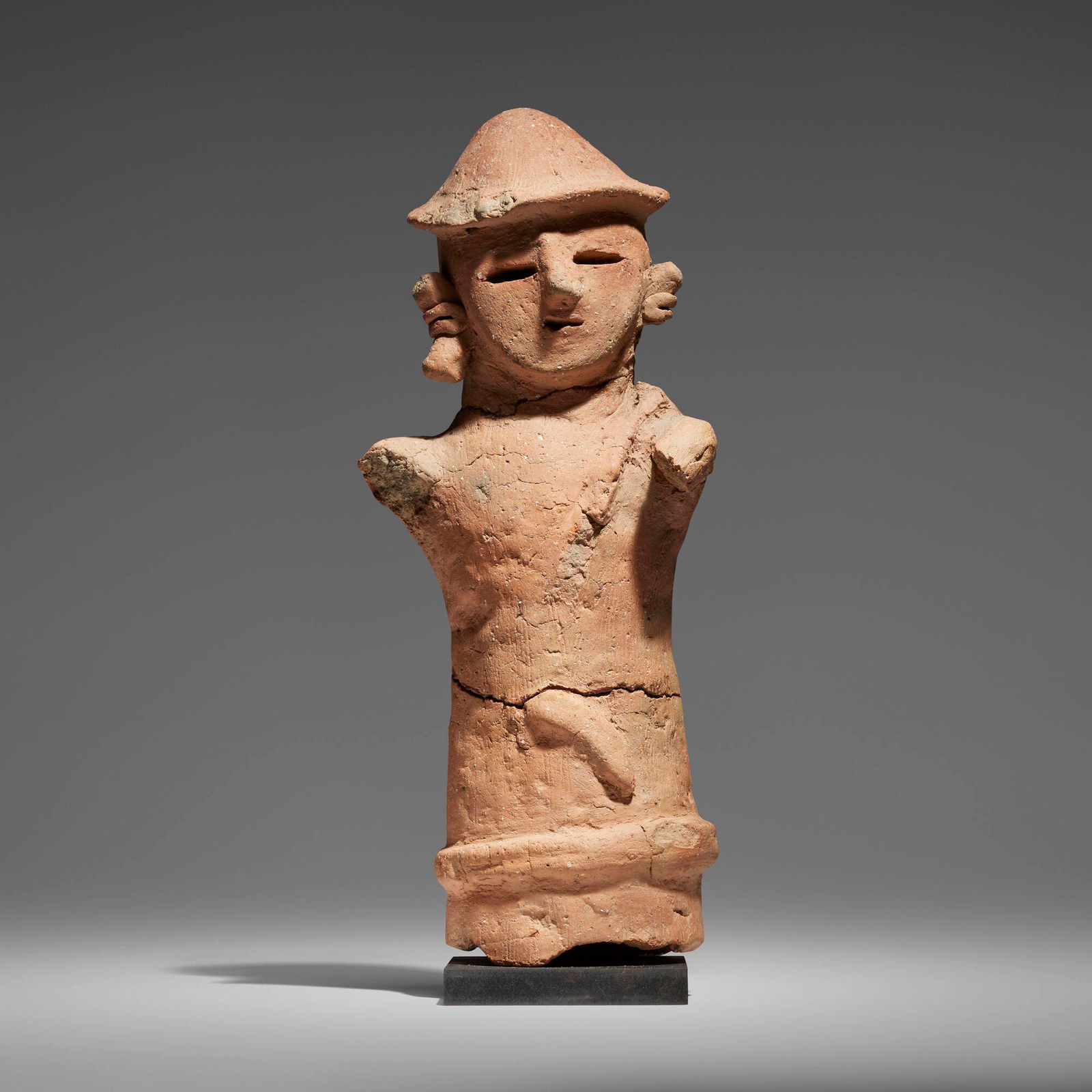 Japanese, Haniwa figure: Japanese Haniwa figure Kofun period (4th/5th century CE)terracotta 17 h x 7.5 w x 5 d in (43 x 19 x 13 cm) Provenance: Private Collection, California This