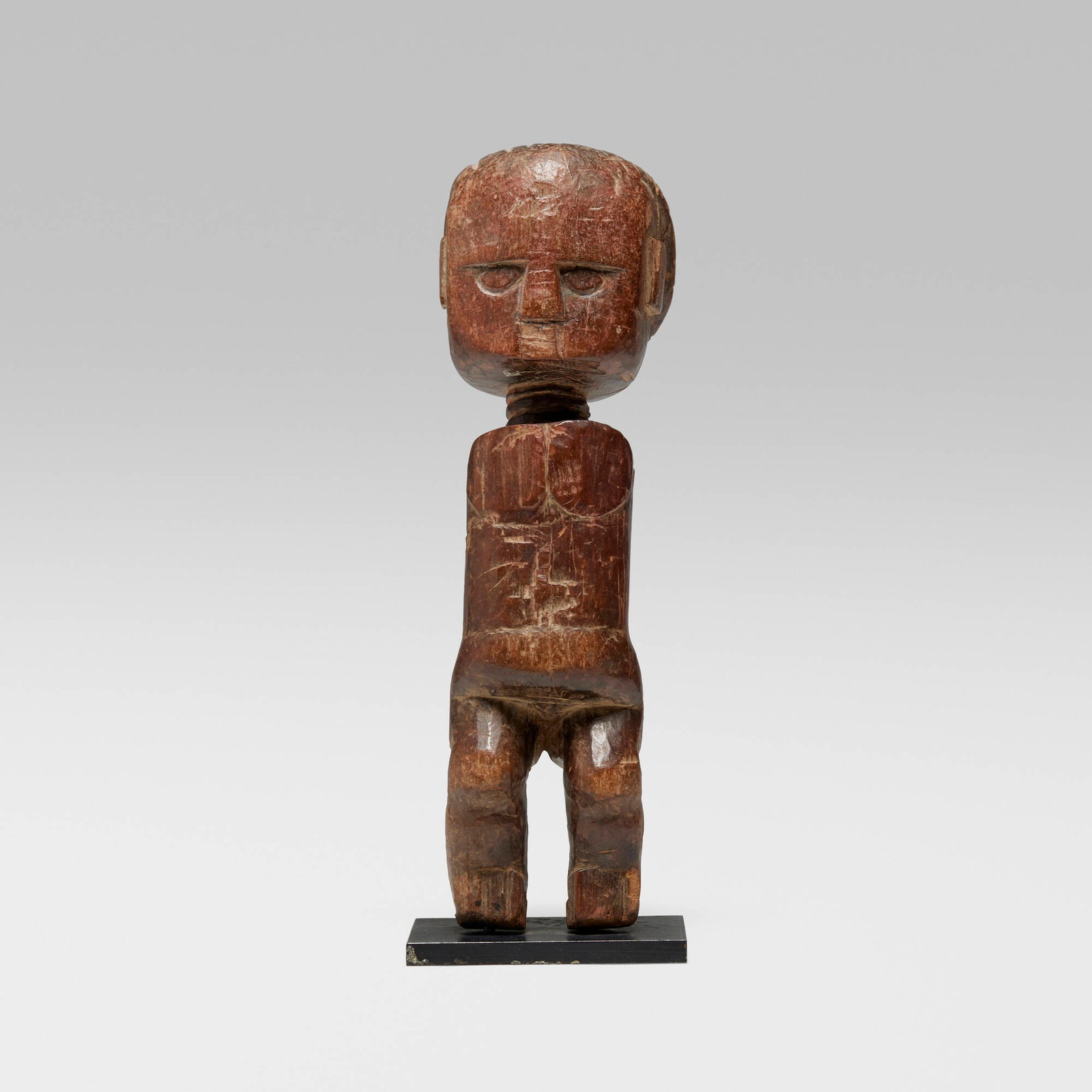 Asante (Ashanti), Figure: Asante (Ashanti) Figure Ghana, 20th century wood 9 h x 3 w x 3 d in (23 x 8 x 8 cm) Provenance: Collection of Lionel and Terry Bell This work will ship from