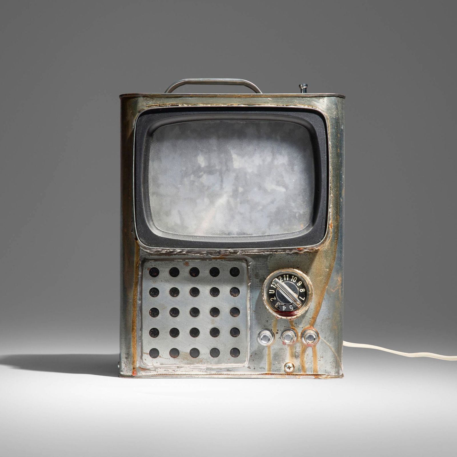 Edward and Nancy Reddin Kienholz, The Econo-Can: Edward and Nancy Reddin Kienholz The Econo-Can 1977metal can, Fresnel lens system, television knobs, and electrical components, epoxy resin 12 h x 8.25 w x 6.5 d in (30 x 21 x 17 cm) Signed an