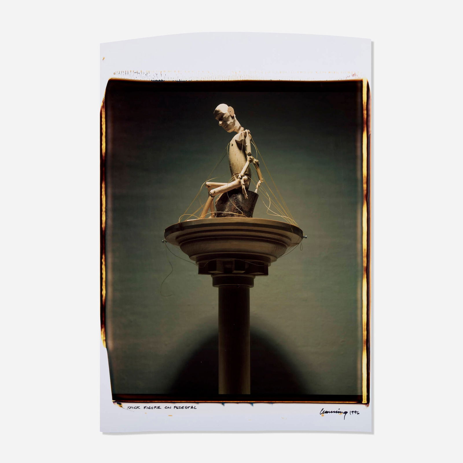 Robert Cumming, Stick Figure on Pedestal: Robert Cumming Stick Figure on Pedestal 1996unique large-format Polaroid Polacolor print image: 24 h x 20 w in (61 x 51 cm) sheet: 31.5 h x 22 w in (80 x 56 cm) Signed, titled and dated to