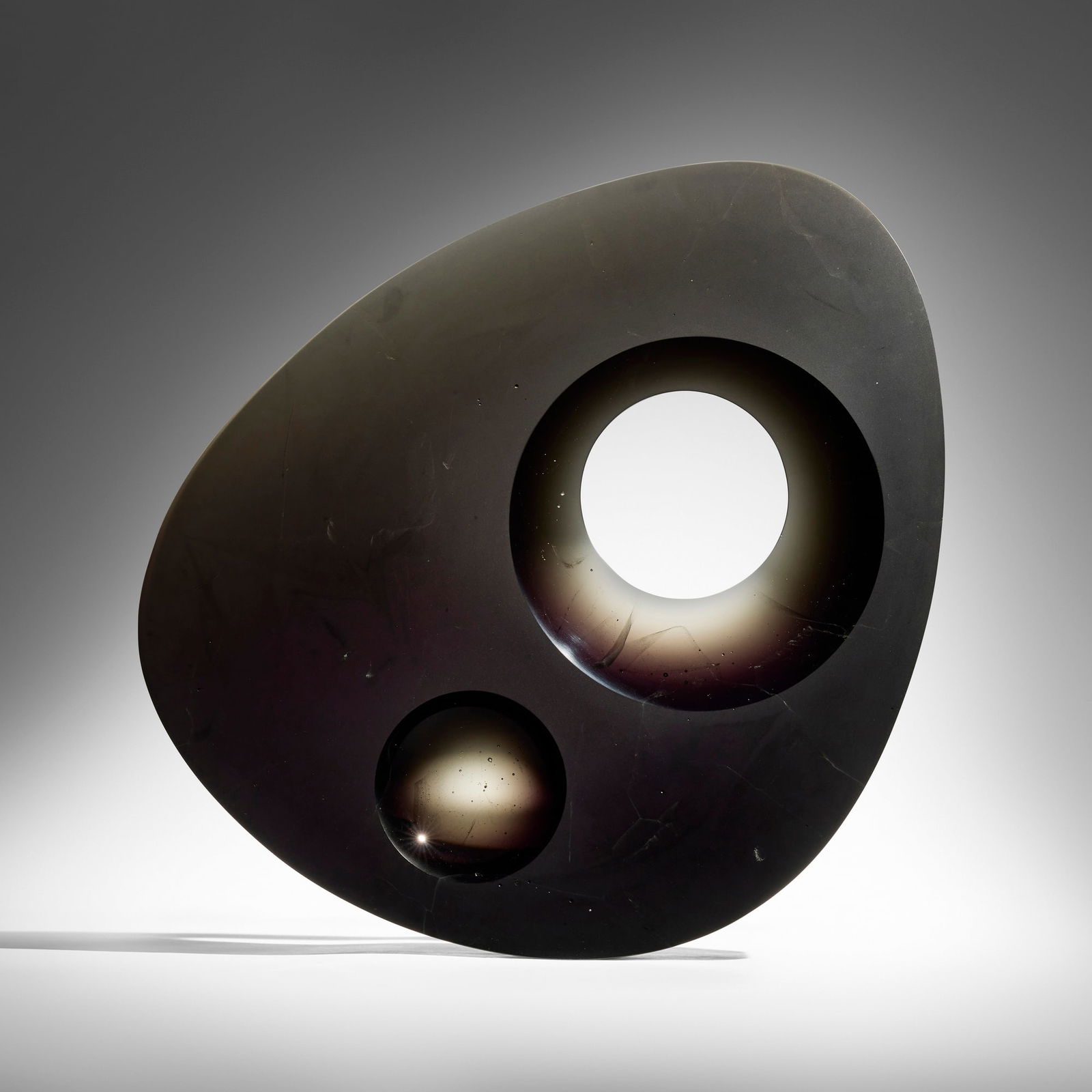 Ales Vasicek, Black Disk: Ales Vasicek Black Disk 2005cast, cut and polished glass 23.25 h x 19.5 w x 2.25 d in (59 x 50 x 6 cm) Etched signature and date to reverse 'Ales Vasicek 2005'. Provenance: