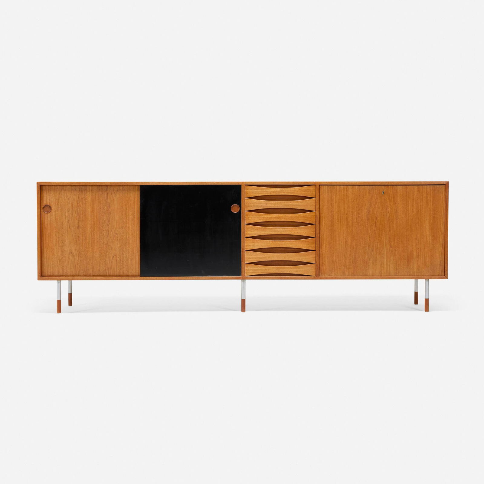 Arne Vodder, Cabinet: Arne Vodder Cabinet Sibast FurnitureDenmark, c. 1960teak, birch, steel, lacquered wood 32 h x 98.25 w x 18.25 d in (81 x 250 x 46 cm) Cabinet features seven drawers, two sliding doors an