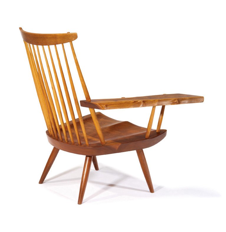 George Nakashima, Free-edge armchair: George Nakashima Free-edge armchair Executed c. 1950s Walnut Studio Inscribed "Skriloff" under seat 32.25" x 30" x 18.75" Estimate: $6000 - $8000