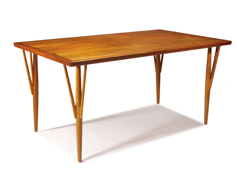 Hans J. Wegner, Rare Dining table: Hans J. Wegner Rare Dining table Designed 1949 Oak, teak Johannes Hansen Retains manufacturer's branded mark 29.75" x 61.5" x 37.25" Literature: Jalk, Greta. Dansk Mobelkunst gennem 40 Aar