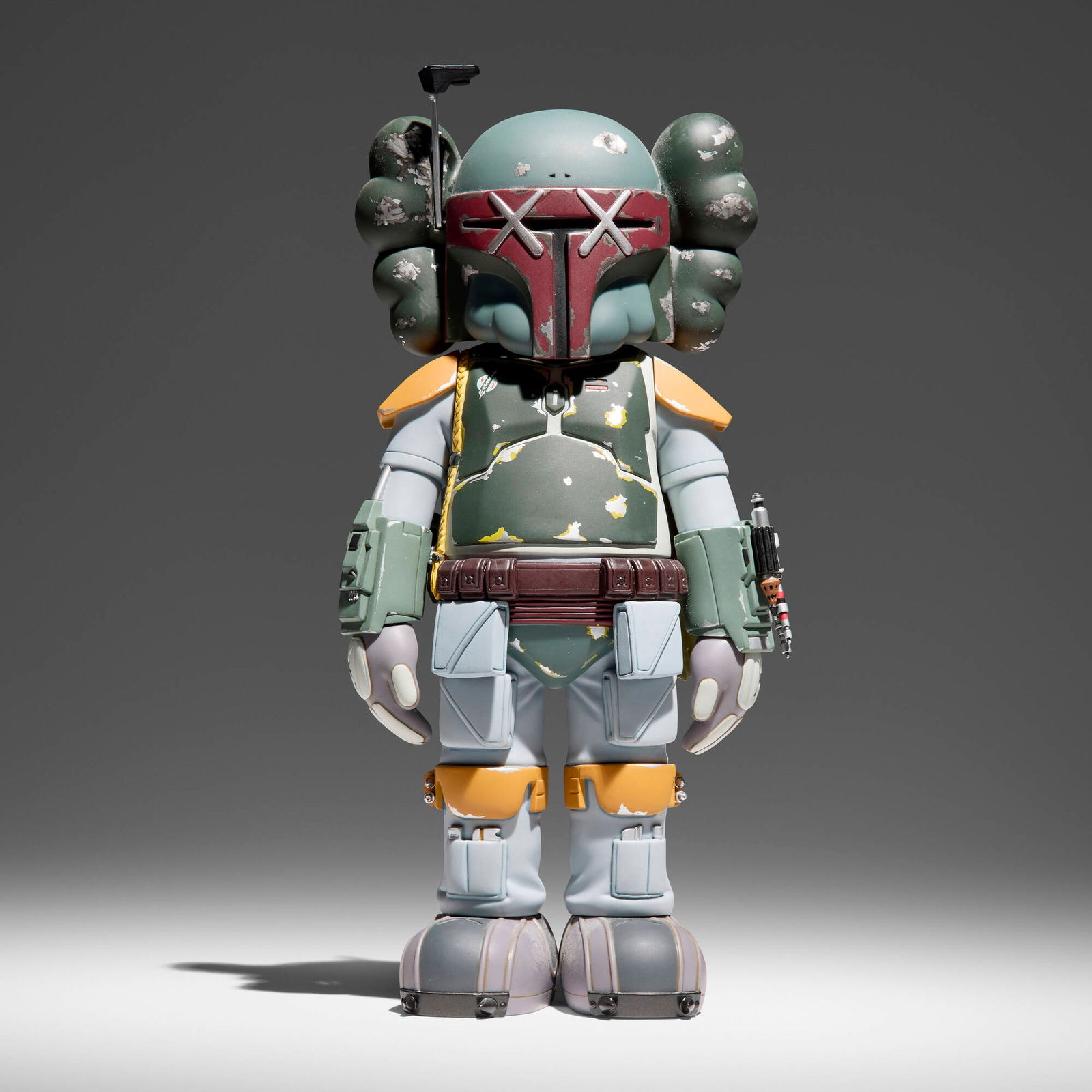 KAWS (Brian Donnelly), Star Wars Boba Fett Companion: KAWS (Brian Donnelly) Star Wars Boba Fett Companion 2013painted cast vinyl 10 h x 5 w x 3.25 d in (25 x 13 x 8 cm) Printed signature, date and manufacturer's mark to underside '?2013 Lucasfilm