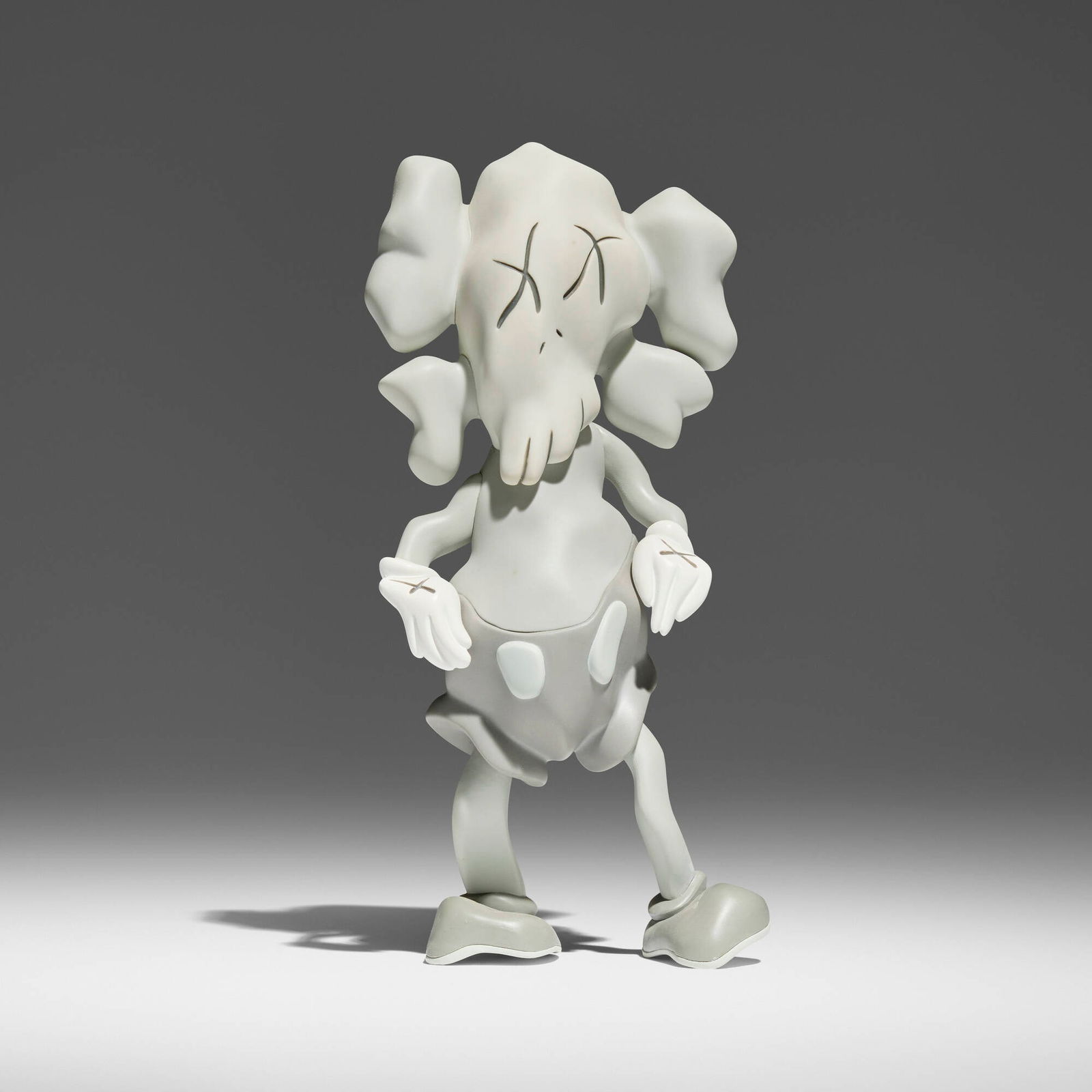 KAWS X Robert Lazzarini, Companion (Grey): KAWS X Robert Lazzarini Companion (Grey) 2010 painted cast vinyl 8.25 h x 4 w x 2.5 d in (21 x 10 x 6 cm) Molded signature, date and manufacturer's mark to underside 'KAWS / Lazzarini 2010 Medicom