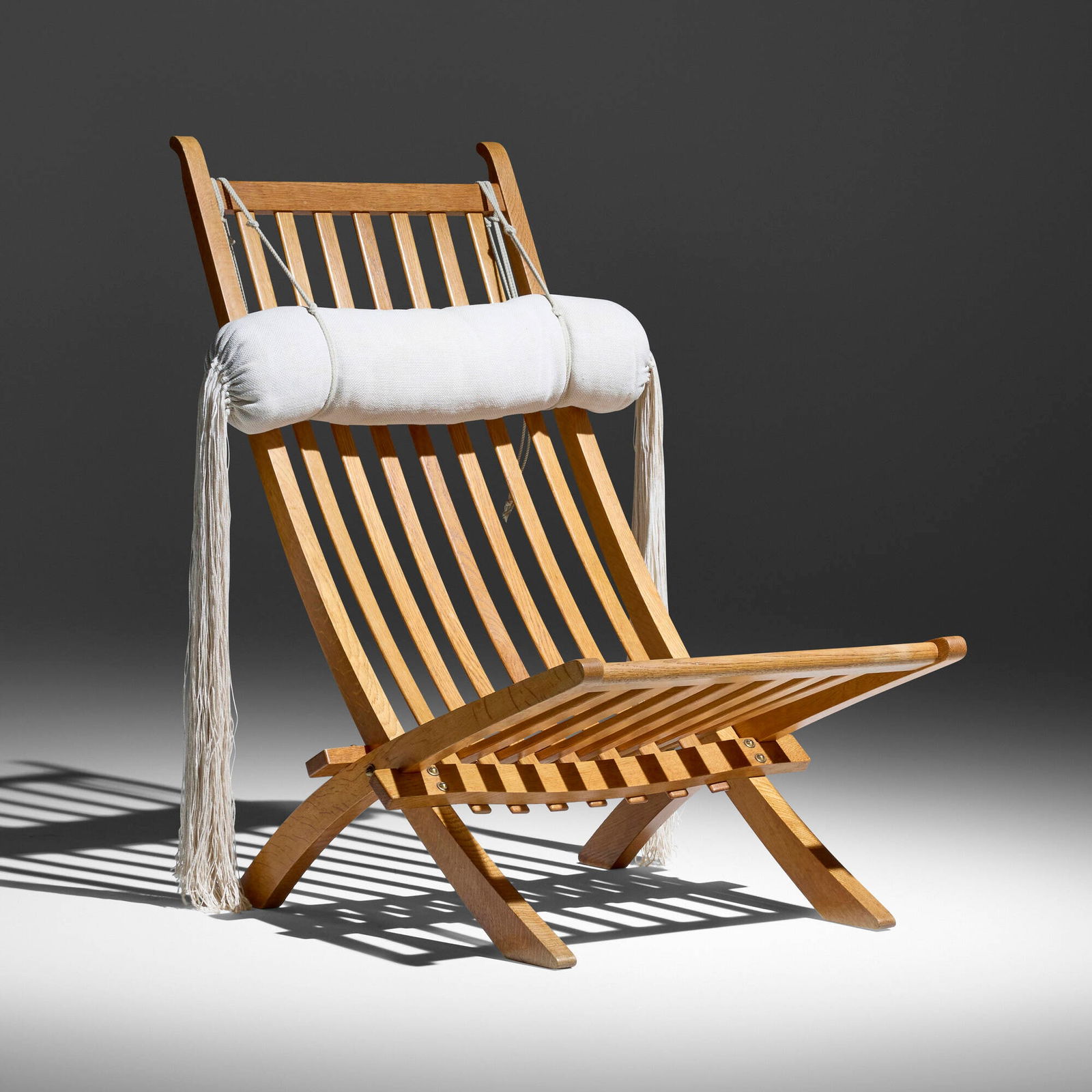 Hans J. Wegner, Safari chair, model JH603: Hans J. Wegner Safari chair, model JH603 Johannes Hansen Denmark, 1962 oak, rope, linen 39 h x 26 w x 33 d in (99 x 66 x 84 cm) Provenance: Important Private Collection, California Literature: