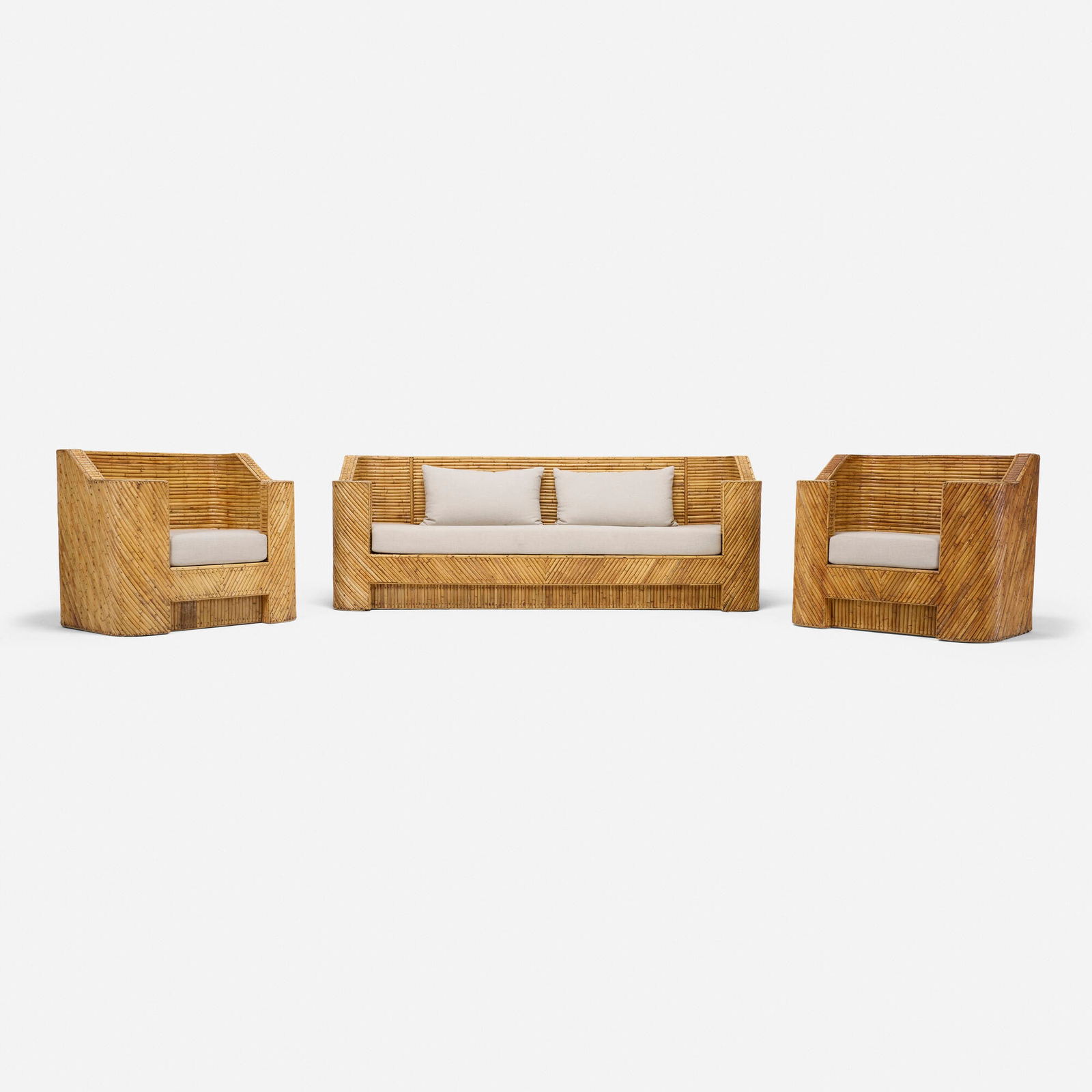 Modern, Three-piece outdoor set: Modern Three-piece outdoor set c. 1975bamboo, upholstery sofa: 35 h x 98 w x 30 d in (89 x 249 x 76 cm) chair (each): 35 h x 41 w x 30 d in (89 x 104 x 76 cm) Set is comprised of a sofa and