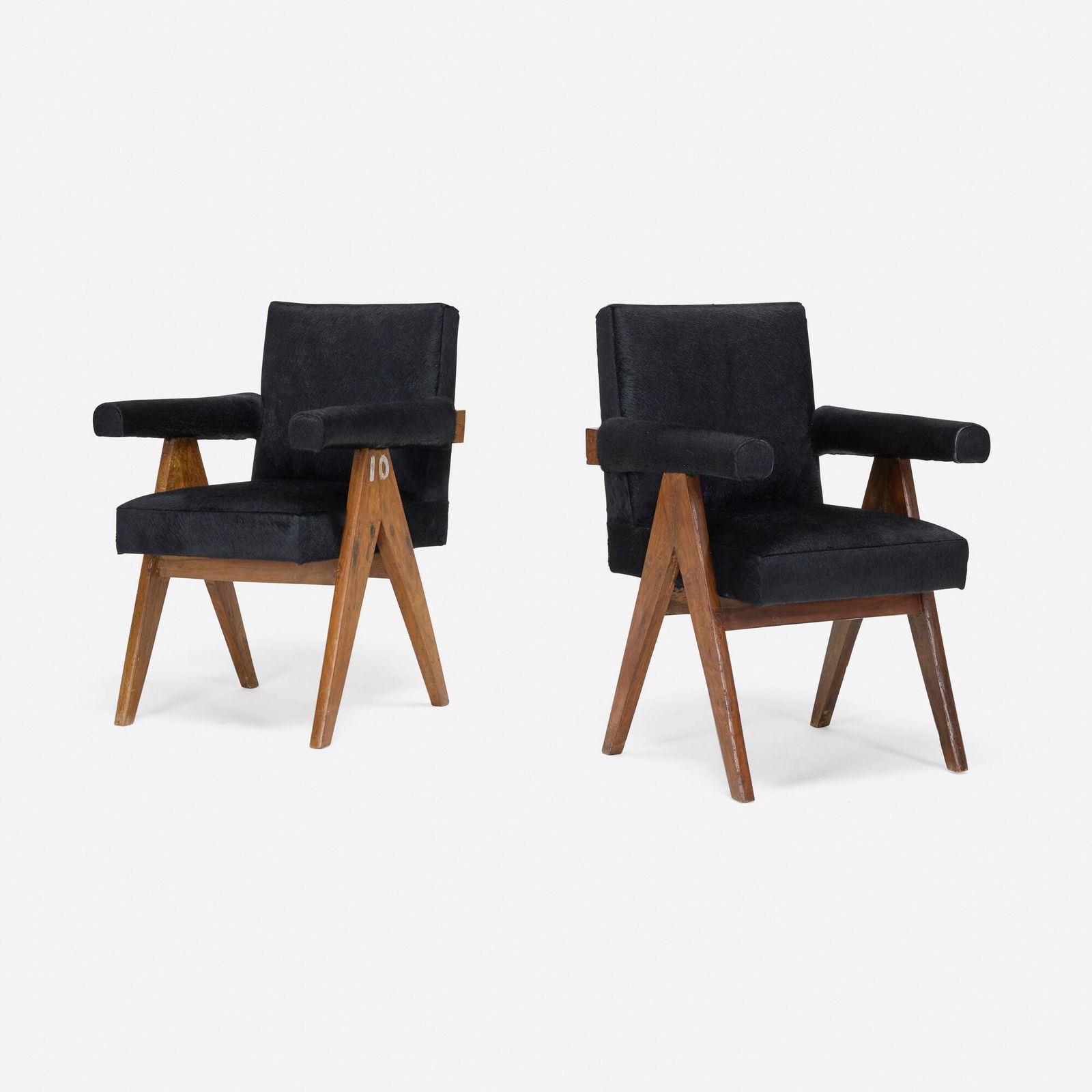 Pierre Jeanneret, Committee chairs from High Court, Chandigarh, pair: Pierre Jeanneret Committee chairs from High Court, Chandigarh, pair France/India, c. 1953 teak, cowhide 33 h x 24 w x 25 d in (84 x 61 x 63 cm) Provenance: High Court, Chandigarh, India | Galerie