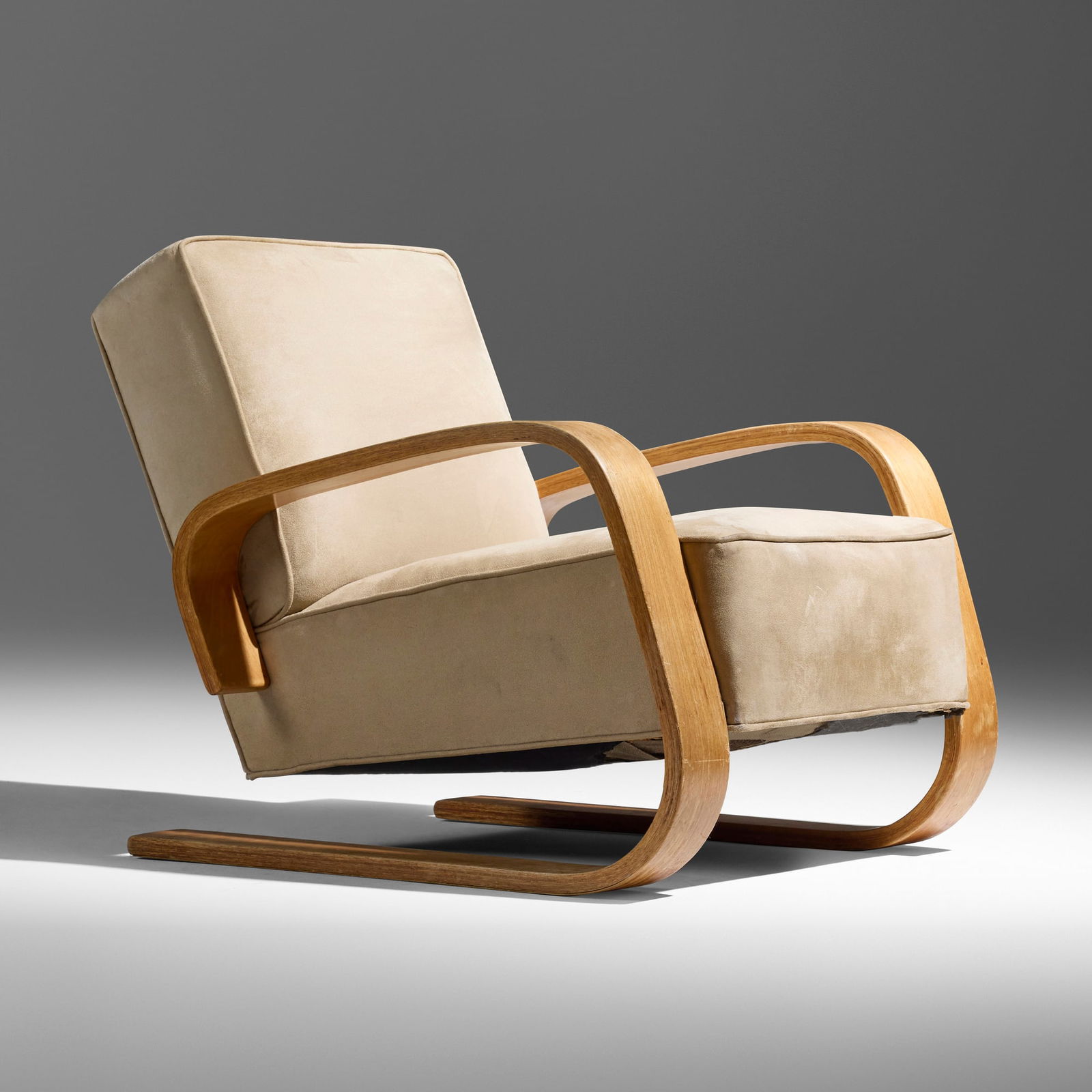 Alvar Aalto, Tank lounge chair, model 37/400 from Case Study House #16, Los Angeles: Alvar Aalto Tank lounge chair, model 37/400 from Case Study House #16, Los Angeles Artek Finland, 1936 / 1946 suede upholstery, laminated birch plywood 28 h x 29 w x 35 d in (71 x 74 x 89 cm) 