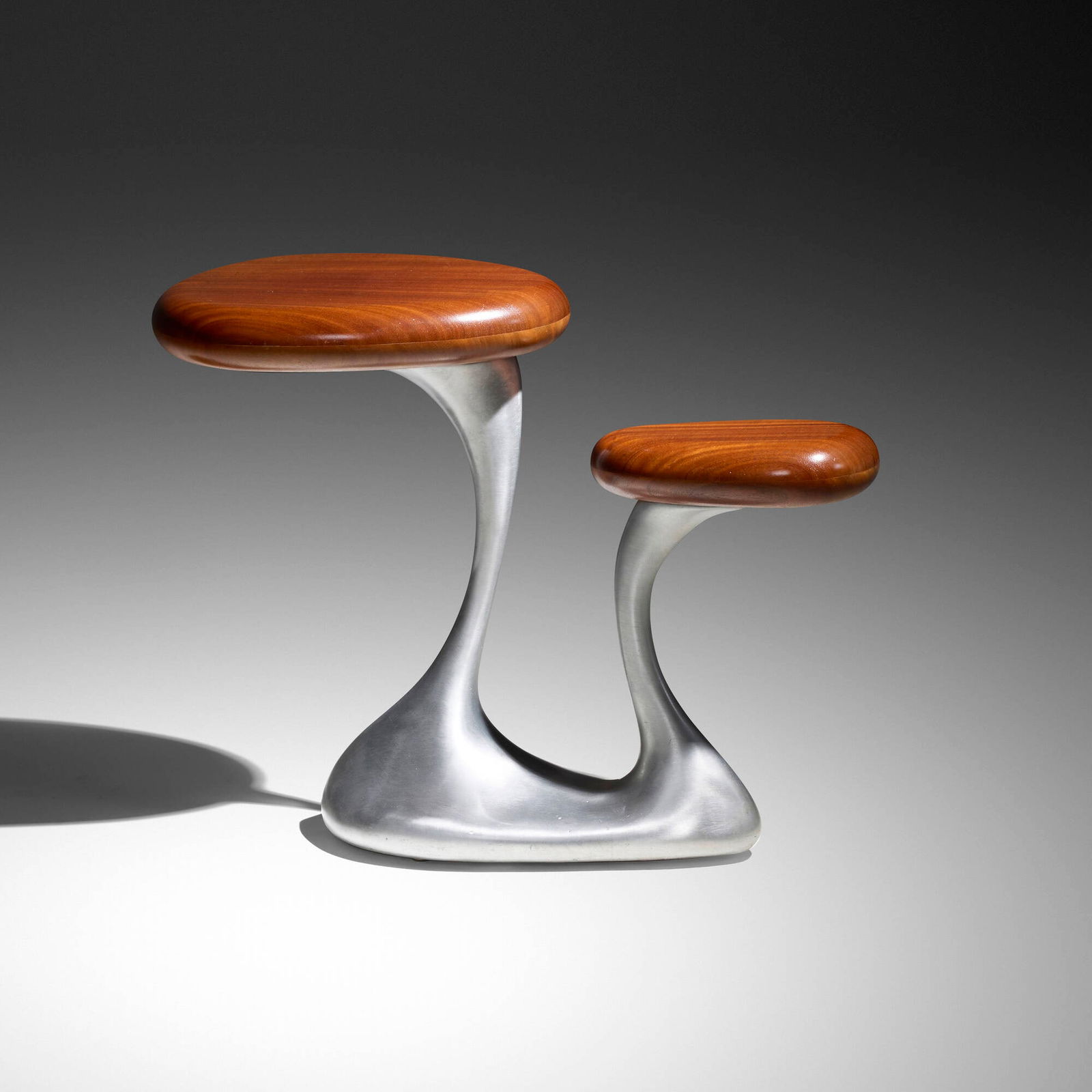 Jordan Mozer, PushMe PullYou prototype: Jordan Mozer PushMe PullYou prototype Jordan Mozer Studios USA, c. 1992 cast aluminum, mahogany 26.5 h x 34 w x 14.75 d in (67 x 86 x 37 cm) This unique prototype is a variation of the