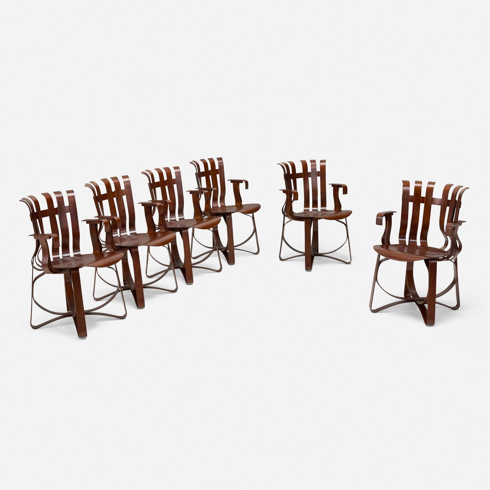 Frank Gehry, Hat Trick armchairs, set of six: Frank Gehry Hat Trick armchairs, set of six KnollStudioCanada/USA, 1990 / c. 2020stained laminated maple 34 h x 22.25 w x 20 d in (86 x 57 x 51 cm) Branded manufacturer's mark to undersi