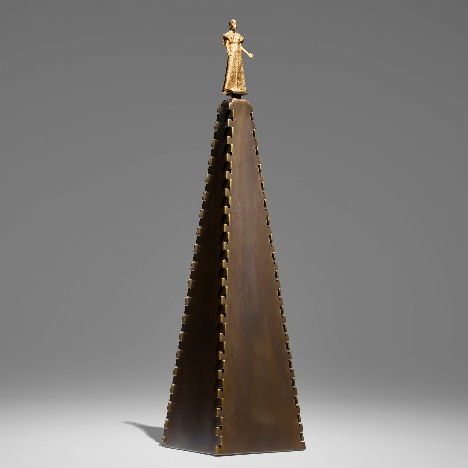 Robert Graham, Untitled (Virgin of Guadalupe): Robert Graham Untitled (Virgin of Guadalupe) gilt and patinated bronze 22.5 h x 5.5 w x 5.5 d in (57 x 14 x 14 cm) Incised signature to reverse 'R Graham'. The figure sits atop a custom