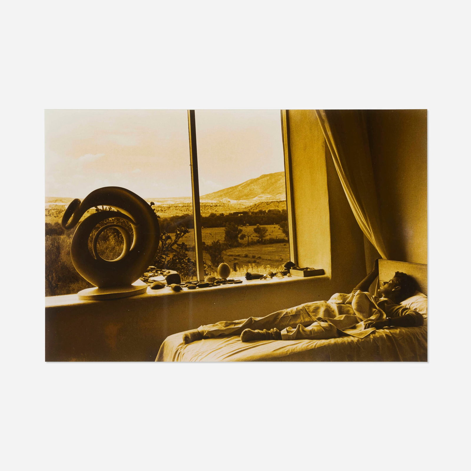 Bruce Weber, Calvin Klein on Georgia O'Keeffe's Bed: Bruce Weber Calvin Klein on Georgia O'Keeffe's Bed 1983 / printed later split-toned gelatin silver print image: 9 h x 13.5 w in (23 x 34 cm) sheet: 11 h x 14 w in (28 x 36 cm) Proven