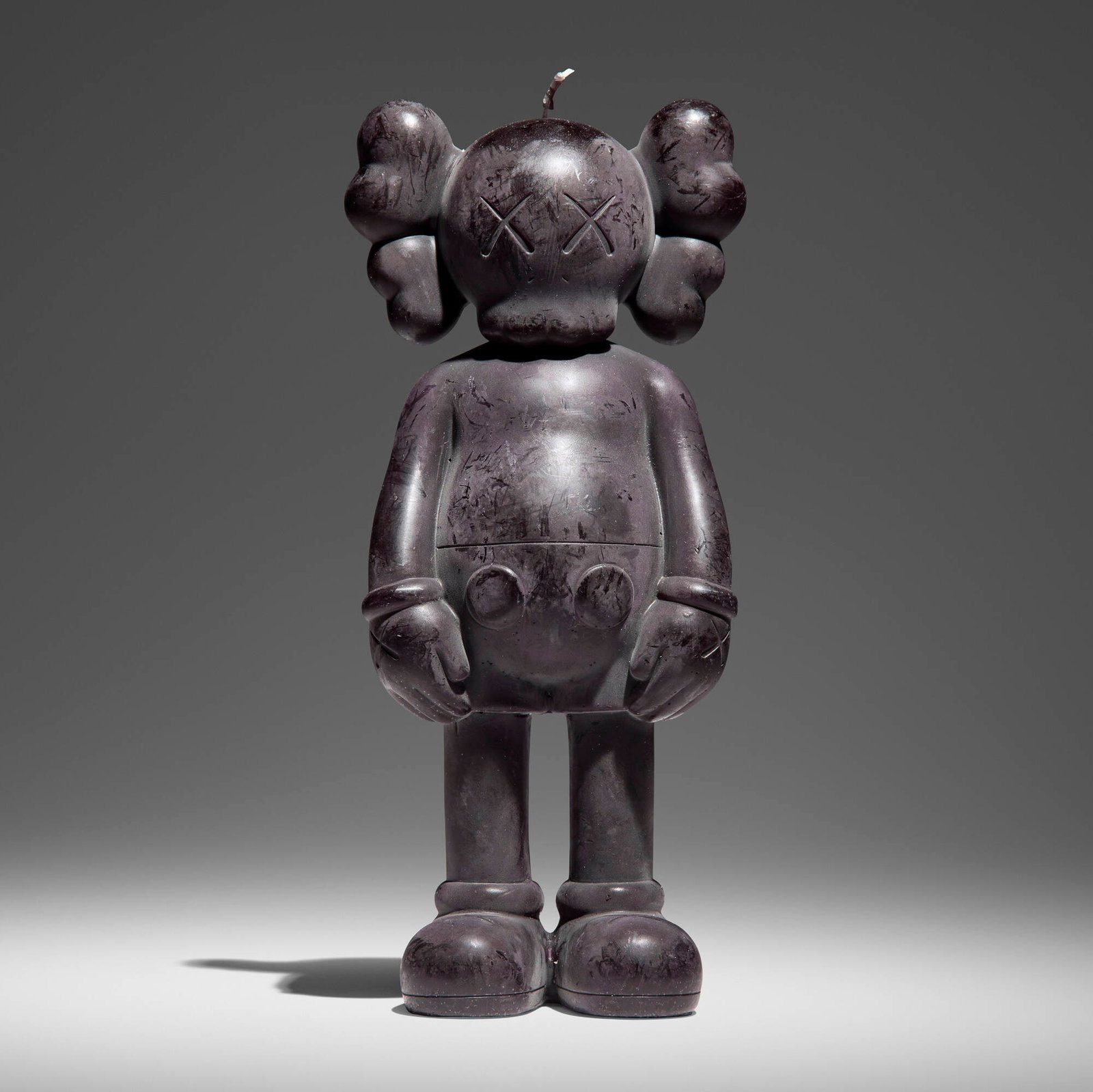 KAWS (Brian Donnelly), Companion Candle (Black): KAWS (Brian Donnelly) Companion Candle (Black) 2012 wax 11 h x 4.25 w x 3 d in (28 x 11 x 8 cm) Signed to underside 'KAWS..'. Decal manufacturer's label to underside 'OriginalFake'. This w