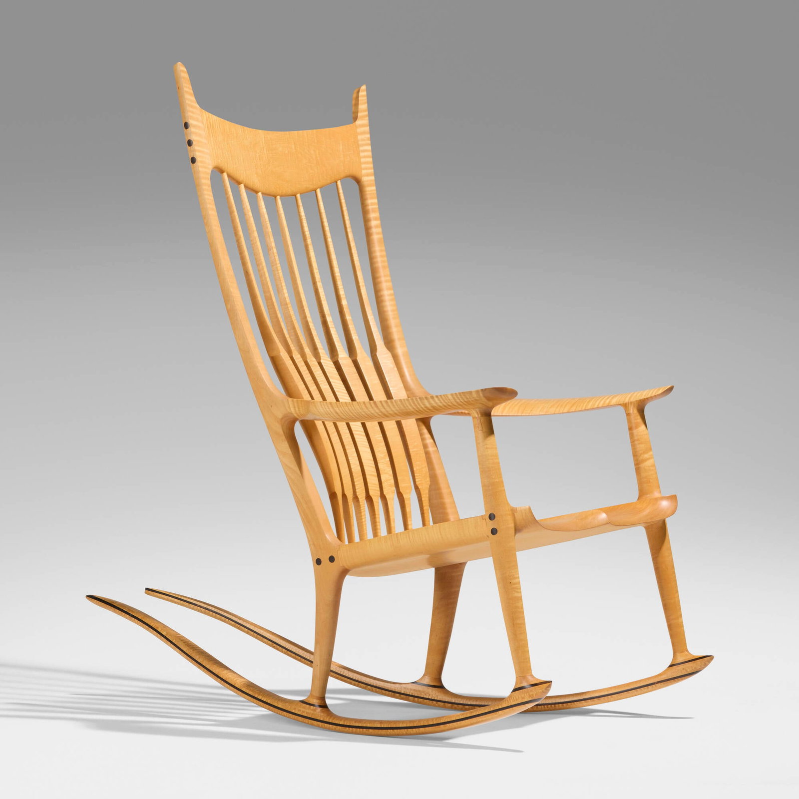Sam Maloof, Rocking chair: Sam Maloof Rocking chair USA, 1991 fiddleback maple, ebony 47.5 h x 27 w x 45 d in (121 x 69 x 114 cm) Carved signature, date and number to underside 'No. 47 1991 Sam Maloof F.A.C.C. ?'. Provenance: