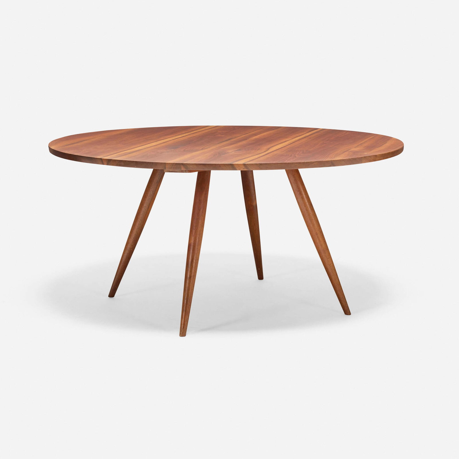 George Nakashima, Round Turned-Leg dining table: George Nakashima Round Turned-Leg dining table Nakashima Studio USA, 1965 American black walnut 28.75 h x 59.75 dia in (73 x 152 cm) Sold with digital copies of the original invoice and letter from
