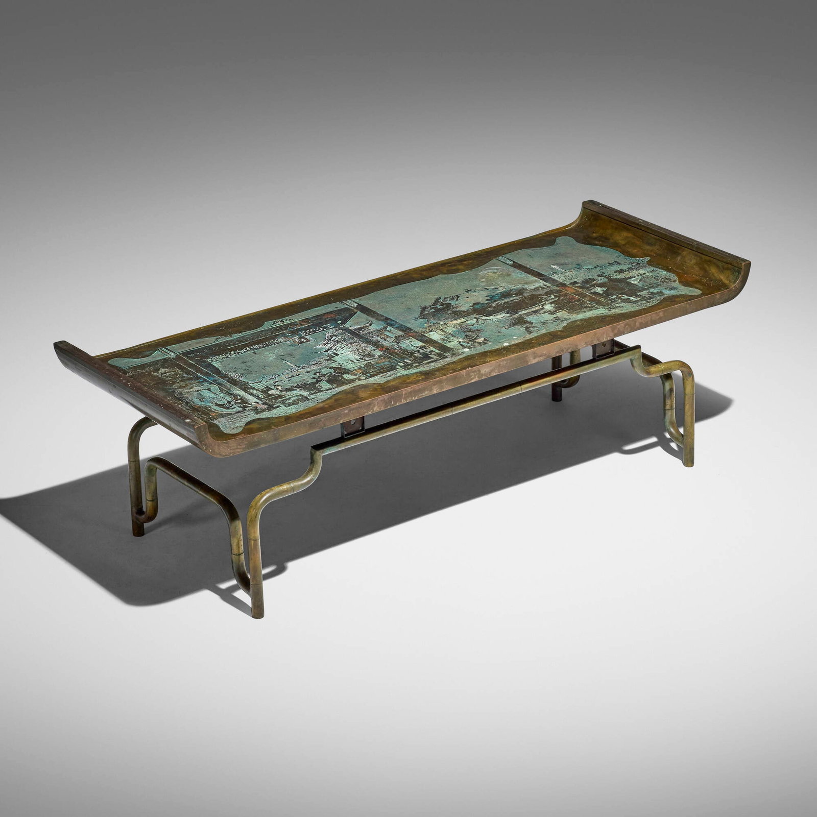Philip and Kelvin LaVerne, Rare Imperial Palace coffee table: Philip and Kelvin LaVerne Rare Imperial Palace coffee table USA, c. 1965 acid-etched and patinated brass over pewter and wood 18.5 h x 57 w x 22 d in (47 x 145 x 56 cm) Raised signature to top