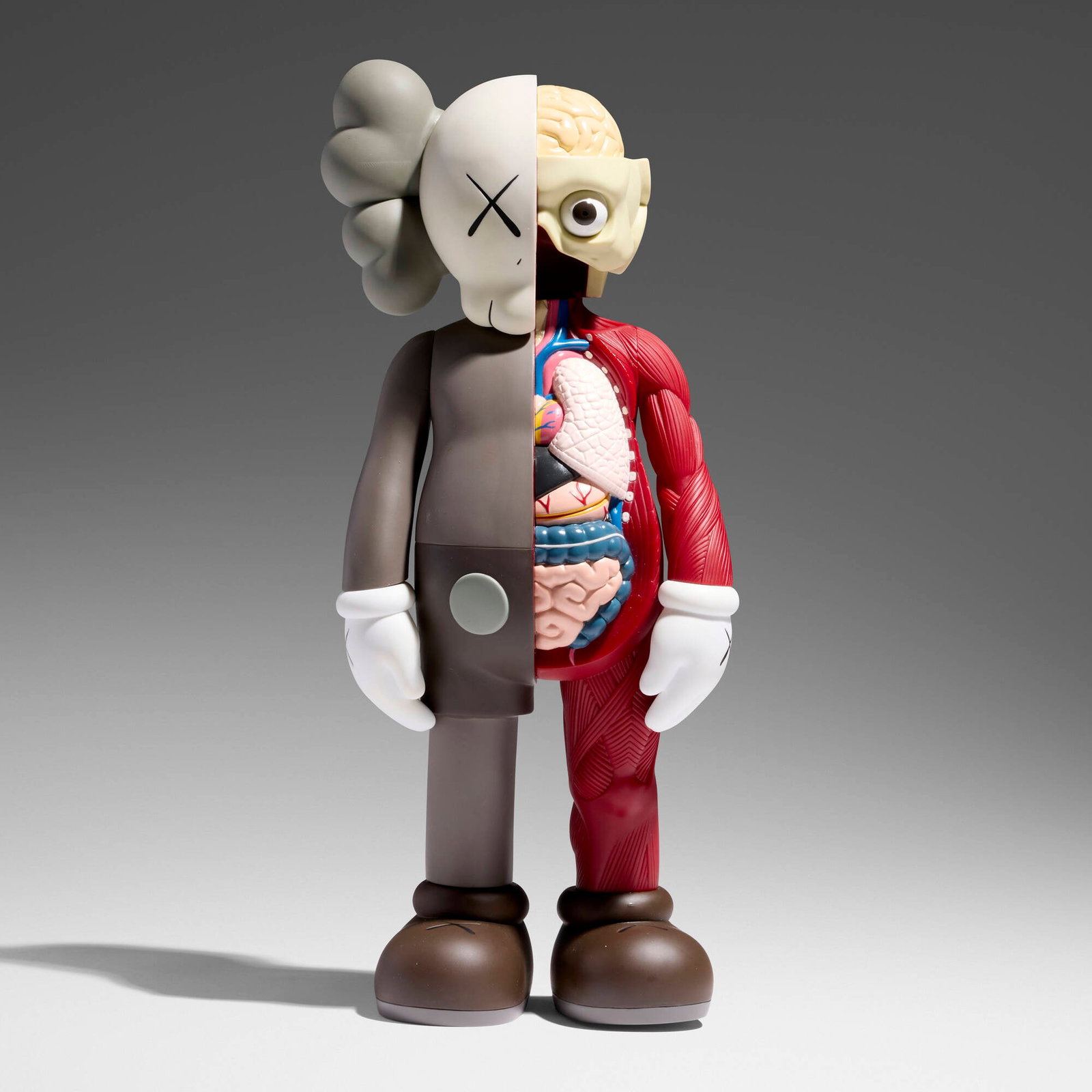 KAWS (Brian Donnelly), Dissected Companion (Brown): KAWS (Brian Donnelly) Dissected Companion (Brown) 2006 painted cast vinyl 14.75 h x 6.25 w x 3.75 d in (37 x 16 x 10 cm) Impressed signature, date and manufacturer's mark to underside '?