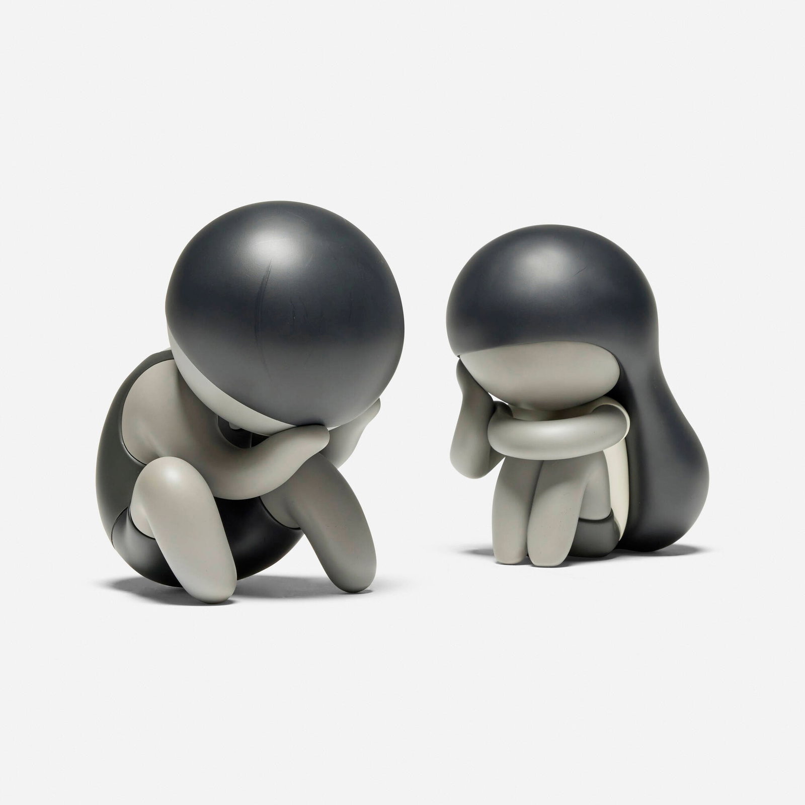 Mike Lee, Lonely Boy (Black); Lonely Girl (White) (two works): Mike Lee Lonely Boy (Black); Lonely Girl (White) (two works) 2020 painted cast vinyl 7 h x 4.5 w x 6 d in (18 x 11 x 15 cm) 7 h x 4.5 w x 5.5 d in (18 x 11 x 14 cm) These works are number 70 from the