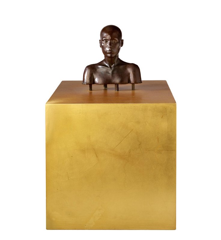 Robert Graham, Single Head: Robert Graham Single Head 1973 Patinated bronze on gilt wooden base Unique Incised signature "RG" and "2" under head 6" x 5" x 2.5" (16" x 10" x 10" with base) LAMA would like to thank the Robert Grah