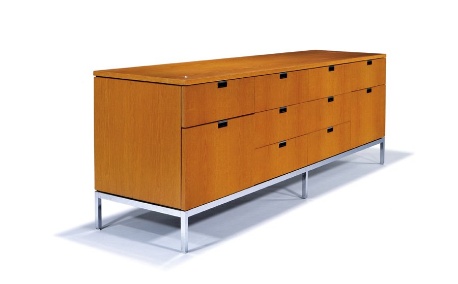 Florence Knoll, Credenza: Florence Knoll Credenza Designed 1961, this example executed c. 1980 Oak, chrome-plated and enameled steel Knoll International 25.5" x 74.5" x 17.75" Estimate: $3000 - $5000