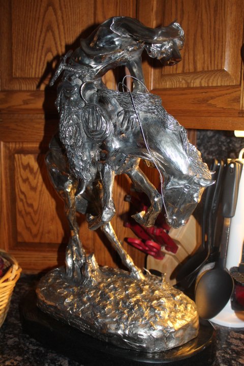 Stunning Silver Sculpture "The Rattlesnake" by Frederic: Sculpture contains 51 OZ of .999 Fine Silver. This Sculpture is mounted on a custom marble base. Dedicated to Theodore Roosevelt 1905. Comes with all its paper work. Frederic Sackrider Remington (Octo