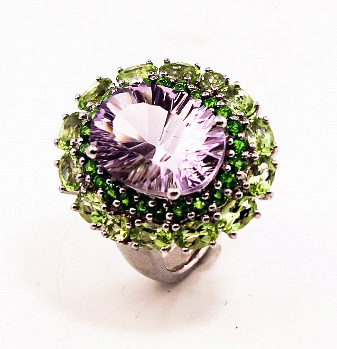 SILVER RING WITH AMETHYST, CHROME DIOPSIDE AND PERIDOT: Stone : AMETHYST, CHROME DIOPSIDE AND PERIDOT Metal : SILVER Cts: 9.00 Finish : POLISHED shape : RD & OVAL Gmwt: 10.00 color: PURPLE AND GREEN size: 7