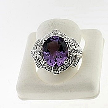 SILVER RING WITH AMETHYST AND WHITE ZIRCON: Stone : AMETHYST Metal : SILVER Cts: 4.00 Finish : POLISHED shape : OVAL Gmwt: 7.00 color : ...