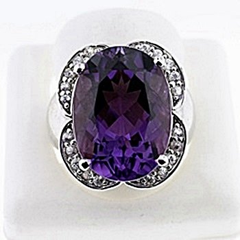 SILVER RING WITH AMETHYST AND WHITE ZIRCON: Stone: AMETHYST ,etal: SILVER Cts: 15.00 Finish : POLISHED color:PURPLE Gmwt: 9.00 Stone:WHITE ZIRCON Size:7 Cts: 0.25