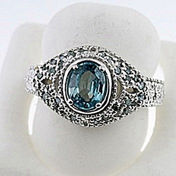 SILVER RING WITH BLUE ZIRCON AND BLUE DIAMOND: Stone : BLUE ZIRCON Metal : SILVER Cts: 2.00 Finish : POLISHED shape : OVAL Gmwt: 5.50 color: BLUE gmwt:5.50 Stone: DIAMOND Cts: 0.15