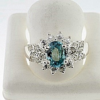 SILVER RING WITH BLUE ZIRCON AND WHITE ZIRCON: Stone : BLUE ZIRCON Metal : SILVER Cts: 2.00 Finish : POLISHED shape : OVAL Gmwt: 3.50 color: BLUE Size: 7.5 Stone: WHITE ZIRCON Cts: 0.50