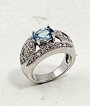SILVER RING WITH BLUE ZIRCON AND WHITE ZIRCON: Stone : BLUE ZIRCON AND WHITE ZIRCON Metal : SILVER Cts: 2.50 Finish : POLISHED shape : RD & OVAL Gmwt:7.00 COLOR: blue Size: 5