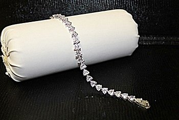 Fancy Rhodium 18 kt over Sterling Morganite Bracelet.: Fancy Rhodium 18 kt over Sterling Morganite Bracelet. Approx 30 cts.