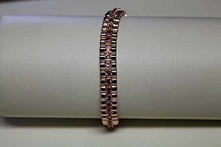 Lady's Fancy Pink Sapphire Bracelet: Lady's Fancy Pink Sapphire Bracelet Rose Gold approx. 10cts. Rose gold over silver