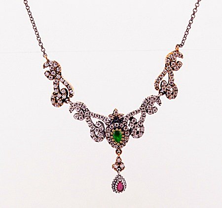 SILVER NECKLACE WITH MARCASITE AND SEMI PRECIOUS STONES: NECKLACE STERLING SILVER STONE SEMI PRECIOUS FINISH POLISHED WEIGHT 11 GMS SHAPE RD,PEAR LENGTH 9 INCHES COLOR GREEN AND RED