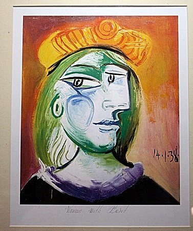 By Picasso "Woman with Beret" lithograph: "Woman with Beret" lithograph after drawing. The drawing is taken from one of Picasso's private sketchbooks and the lithography was done in Paris. Image size approx. 19x18.5. Ornate framed and matted.