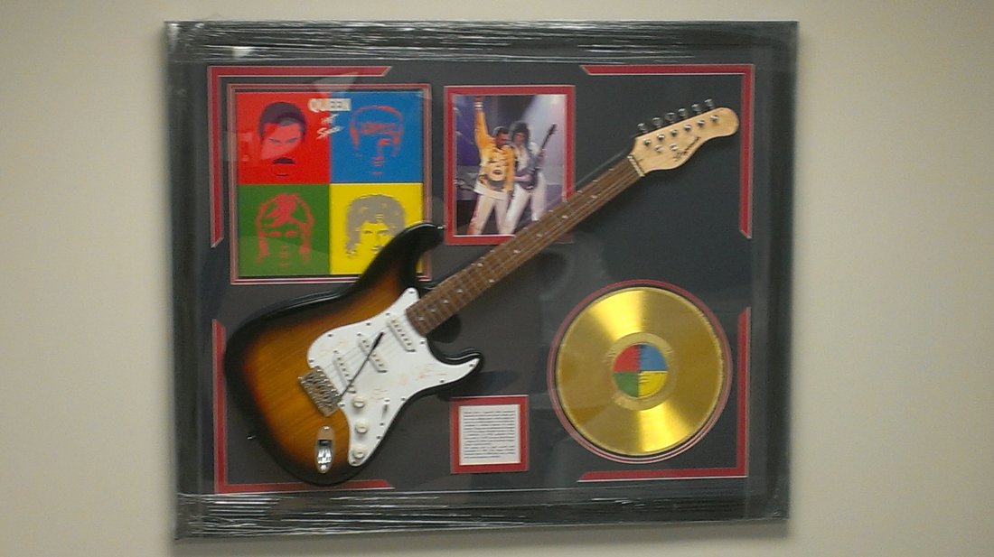 Queen Autographed Guitar "Hot Space": Queen Laser Engraved, Matted and Framed Signature Guitar (Approx. 42 1/2" X 34 1/2") Featuring the Signatures of: Freddie Mercury Roger Taylor Brian May John Deacon - Authentic Legends Guitar (Approx.