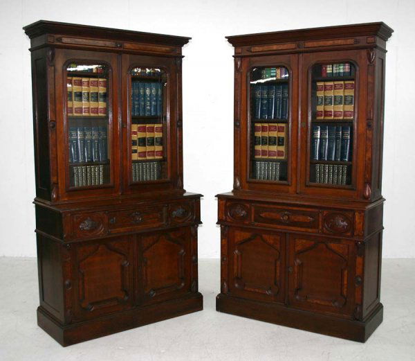 Rare Matched Pair Victorian Secretary Desks: Rare Matched Pair of American Walnut Renaissance Revival Secretaries. Each having burl panel accents, fruit carved pulls and fitted interiors. Circa 1870. 89"h x 48"w x 22"d