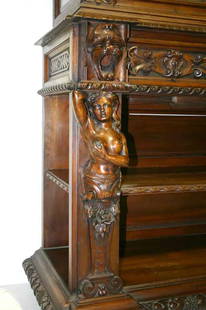 Victorian Renaissance Parlor Cabinet with Figural Ca: Victorian Renaissance Parlor Cabinet with Figural Carved Base Supporting a Glass Cabinet Top. C 1870. 97"h x 52"w x 25"d