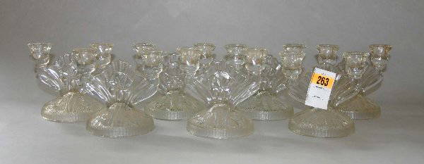 Seven Clear Iris Depression Glass Candlesticks.: Seven Clear Iris Depression Glass Candlesticks.