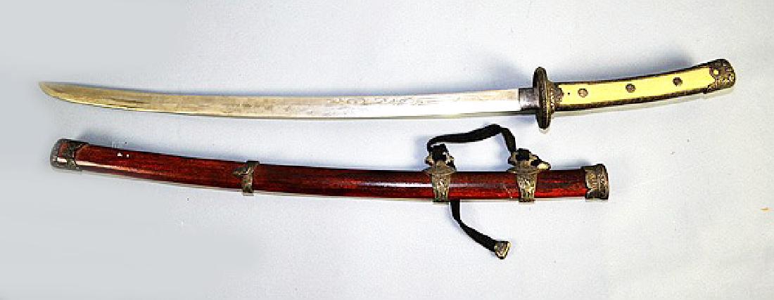 A JAPANESE KATANA WITH WOOD SCABBARD. JO29 (1 of 5)