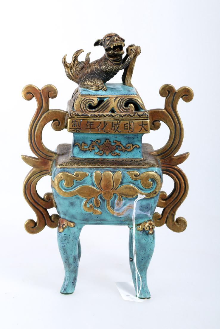 A CHINESE POTTERY CENSER: A CHINESE POTTERY CENSER, H 10 1/2", L 7", "AS IS" CONDITION:On four legs with gilt accents. From the estate of Barbara K. Wrigley of Grosse Pointe Farms.Domestic shipping (48 states): $59.95.