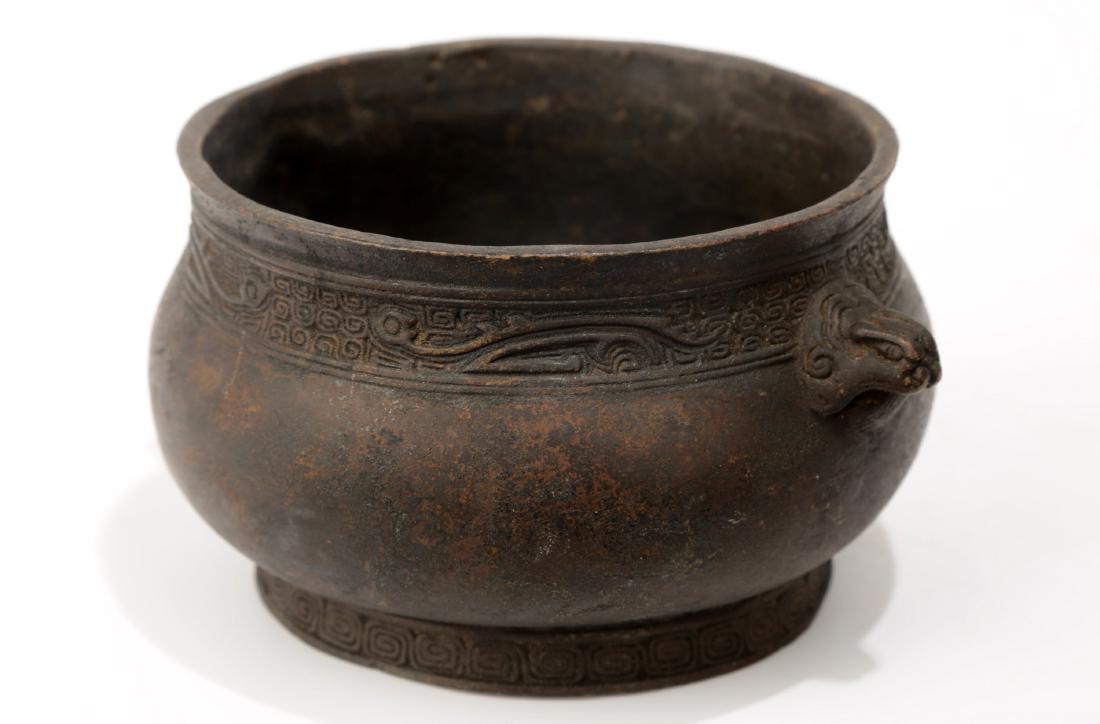 A BRONZE CENSER WITH TWO LION-FORMED EARS ON EITHER (1 of 9)