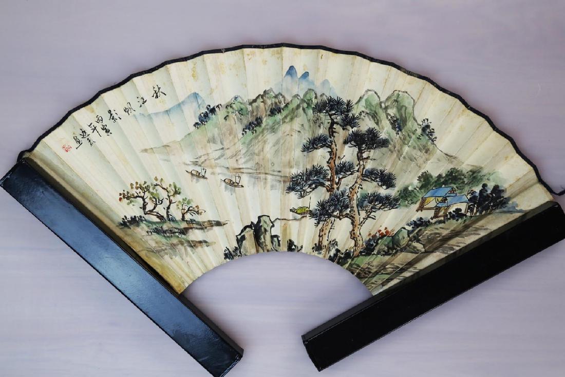 CHINESE PAINTED ON PAPER FAN,DEPICTING THE AUTUMN RIVER: CHINESE PAINTED ON PAPER FAN,DEPICTING THE AUTUMN RIVER VIEW AND HE BOAT IN THE RIVER IS RAISE THE SAILS SCENERY. Chinese fan painting of a landscape scene, ink and color on paper, calligraphy signatu