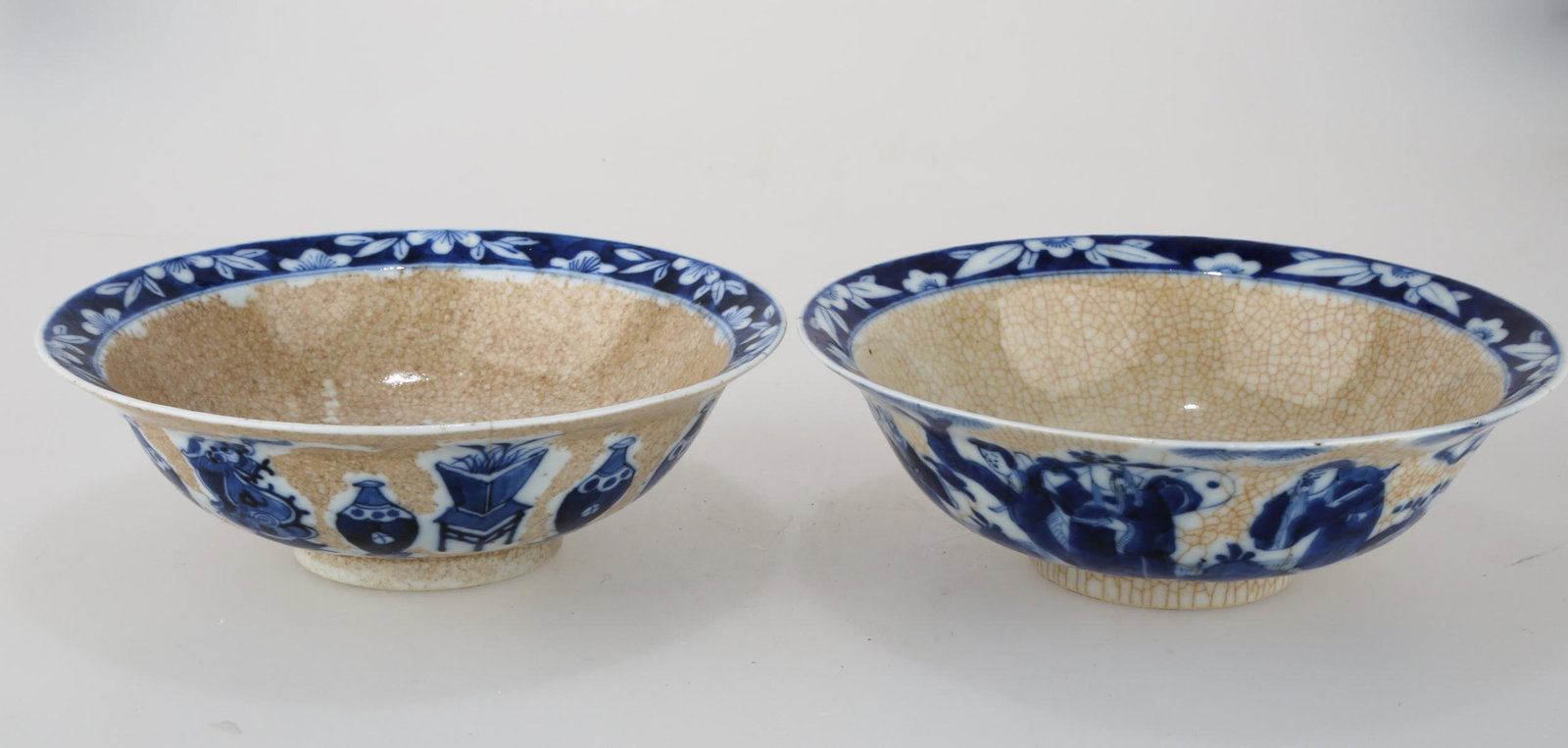 (2) A PAIR OF MING DYNASTY STYLE BLUE AND WHITE: (2) A PAIR OF MING DYNASTY STYLE BLUE AND WHITE PORCELAIN OVER CRACKLE BOWL.C207. C Property from a Private American Collection CONDITION: Good, no significant damage or repairs observed. Measure: Hei
