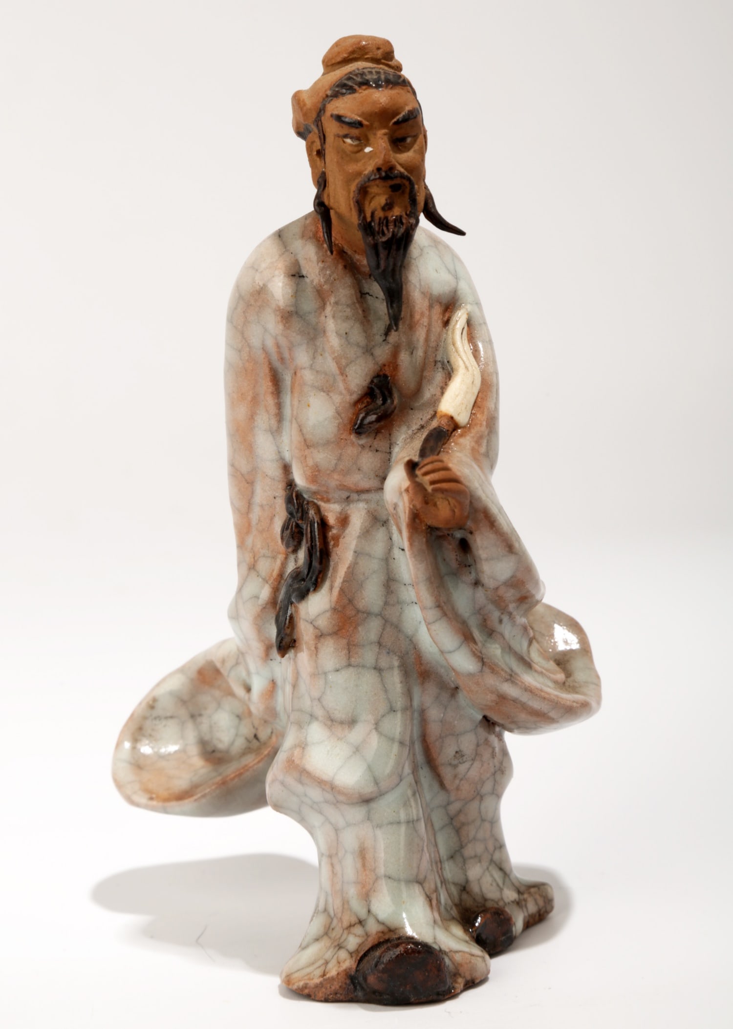 A SHIWAN SCULPTURES DEPICTING THE POET LI BAI.C047: A SHIWAN SCULPTURES DEPICTING THE POET LI BAI.C047 China, Qing dynasty. CONDITION: No other signs of damage, loss or repair. overall wear due to age. Measure: Height 5.5",diameter 3.43". Domestic ship