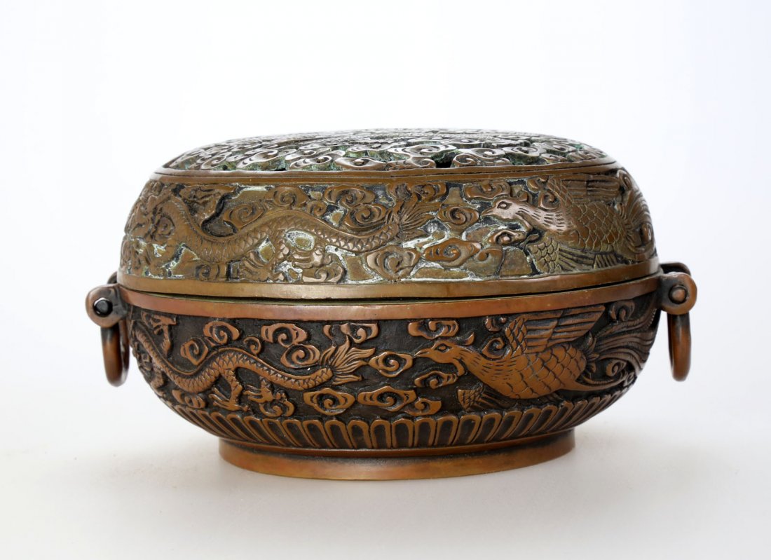 A DRAGONS AND PHOENIXES CARVED HANDWARMER. (1 of 8)